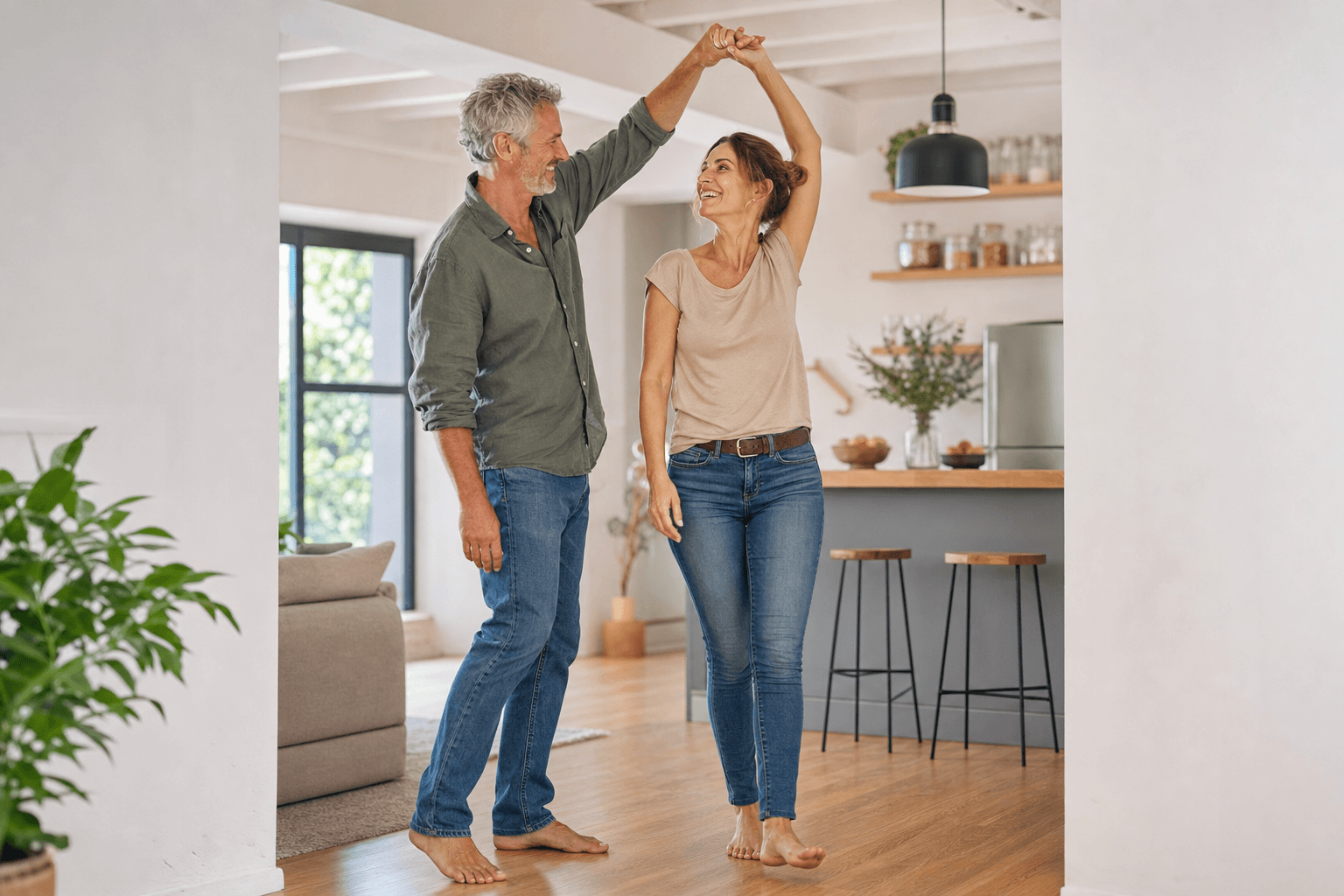Couple dancing together at home